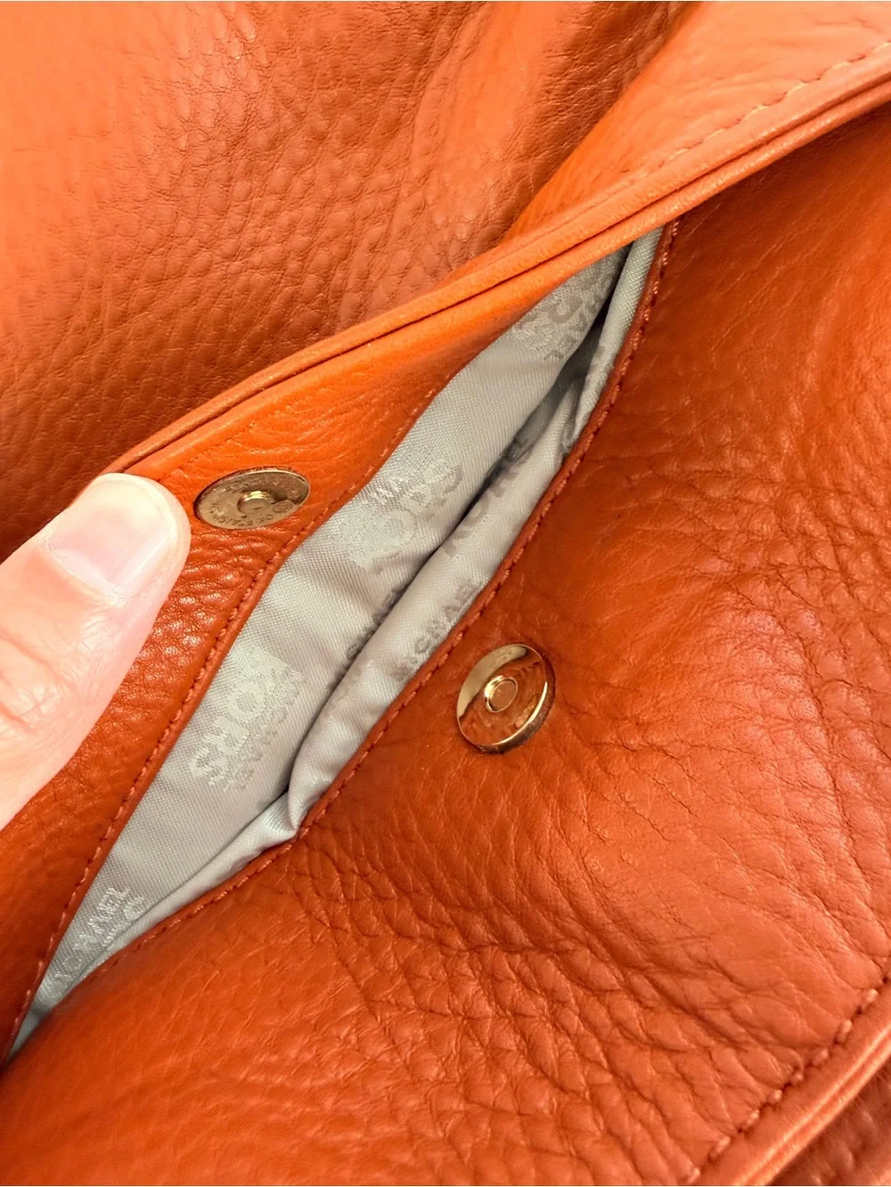 Michael Kors Orange Leather Bucket Crossbody